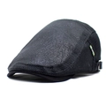 Detail view of breathable black mesh beret cap with adjustable strap and sports label - Adjustable / Black
