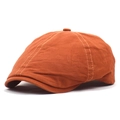 Detail of caramel cotton flat cap with white contrast stitching and top button - Adjustable / Orange