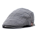 Detail of grey vintage cotton beret featuring raw edge quilted checks and metal buckle - Adjustable / Gray