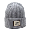 Detail of grey striped knit beanie with vintage patch and vertical texture - Light Gray