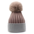 Detail of two-tone knit beanie featuring brown ribbed texture and fluffy faux fur pompom - M (56-58cm) / Pink + Grey
