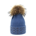 Detailed knit texture of blue winter beanie with sparkling lurex and star pattern - Blue