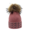 Close-up of pink ribbed knit beanie featuring fluffy fur pom and grey star accent - M (56-58cm) / Pink
