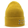Detail of mustard yellow knit beanie showing honeycomb texture and silver metal rings - Yellow