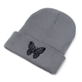 Medium gray knitted beanie for women featuring a detailed black butterfly embroidery - M (56-58cm) / Gray
