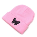 Detailed view of pink knitted beanie featuring black butterfly embroidery on cuff - M (56-58cm) / Pink