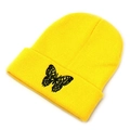 Close-up of black butterfly embroidery on bright yellow ribbed knit beanie hat for women - M (56-58cm) / Yellow