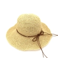 Close-up detail of hand-woven raffia sun hat with elegant brown decorative bow rope - M (56-58cm) / Beige