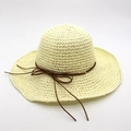 Elegant wide brim raffia sun hat in beige with a decorative dark brown cord bow - M (56-58cm) / Cream