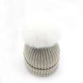Classic light grey knit beanie with white fur pom pom for women winter warmth - Beige