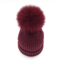 Deep red knitted beanie with oversized faux fur pom pom and wide ribbed turn-up cuff - Burgundy