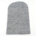 Detailed view of gray knit beanie showing soft textured fabric and elastic weave pattern - Light Gray