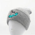 Gray knitted beanie with embroidered puppy on surfboard for winter street style - Gray