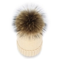 Detail of beige knit beanie with classic cable pattern and large fluffy faux fur pompom - Beige