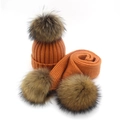 Orange ribbed knit beanie and scarf set with fluffy brown faux fur pom-poms for winter wear - Adult Style / Orange
