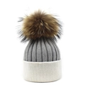 Detailed texture of two-tone cashmere knit beanie with large fluffy pom-pom decoration - Light Gray and White