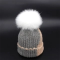 Women's autumn knit beanie featuring a white fur pompom and color-blocked ribbed design - Medium Grey
