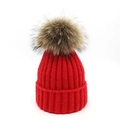Red knit wool beanie for women featuring a large brown fluffy faux fur pompom detail - M / Red