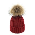 Knitted wool beanie in deep wine red with a large fluffy raccoon fur pompom detail - M / Burgundy