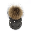 Detail of dark grey knit beanie with fluffy fur pompom and delicate faux pearls - Dark Gray