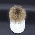 White winter knit hat for women with fluffy fur pompom and elegant pearl decorations - White
