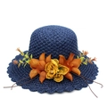 Navy blue woven straw sun hat with decorative 3D floral accent and wavy brim for beach - Navy Blue