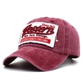 Vintage burgundy washed cotton baseball cap featuring embroidered Western 1985 patch - Adjustable / Red