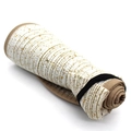 Detail of a foldable beige straw sun visor with gold sequins and black elastic band - Milk White