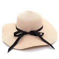 Classic beige wide brim straw hat with elegant black ribbon bow for summer sun protection - Pink
