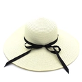 Women's wide brim straw sun hat with black ribbon bow for summer beach vacation - Creamy White