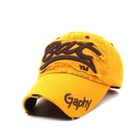 Vintage yellow baseball cap with brown letter embroidery and distressed fabric texture - Dark Yellow