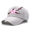 Detailed view of pink floral embroidery on a grey textile baseball cap with curved brim - Adjustable / Gray