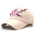 Close-up of pink flower embroidery on a beige baseball cap with precise stitching - Adjustable / Beige