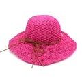 Detail of rose pink raffia sun hat showing hollowed-out brim and brown leather cord bow - M(56-58cm) / Rose Red