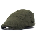 Detail view of military green newsboy cap with polka dot texture and metal side buckle - Adjustable / Green