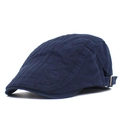 Detail of dark blue cotton flat cap featuring diamond quilted embroidery and metal buckle - Adjustable / Navy Blue