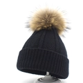 Women's black knit beanie with a large brown raccoon fur pompom for winter warmth - M / Black