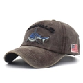 Detailed close-up of embroidered shark and US flag on washed cotton brown baseball cap - Adjustable / Coffee