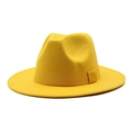 Detailed view of the yellow wool fedora hat showing textured ribbon and fine fabric - Yellow