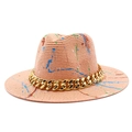 Straw Panama hat in peach pink with colorful paint splatters and a bold gold chain link - Pink