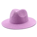 Close-up detail of the woven texture and crown shape of this purple straw sun hat - One Size / Purple
