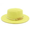 Detail of yellow straw hat featuring a gold chain buckle and cream woven band - Neon Yellow
