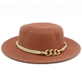 Detail of auburn straw boater hat featuring a cream rope band and gold metal chain links - Deep Pink