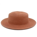 Dettaglio della trama fitta di un cappello di paglia estivo marrone rossiccio a tesa larga - Taglia unica / rosa scuro