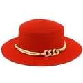 Detail of red straw boater hat with decorative off-white cord and golden metal buckle - Red