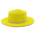 Detail view of bright yellow straw boater hat with stylish silver chain band decoration - Yellow
