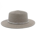 Detail of taupe straw flat top hat featuring fine weave texture and silver chain trim - Gray