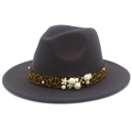 Detail of dark grey wool fedora featuring leopard print band with pearls and floral accents - Dark Gray