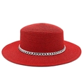 Detailed macro view of the finely woven red straw material and silver chain decor - Red
