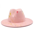 Detail of pink fedora featuring artistic yellow red and black paint splatter texture - Pink